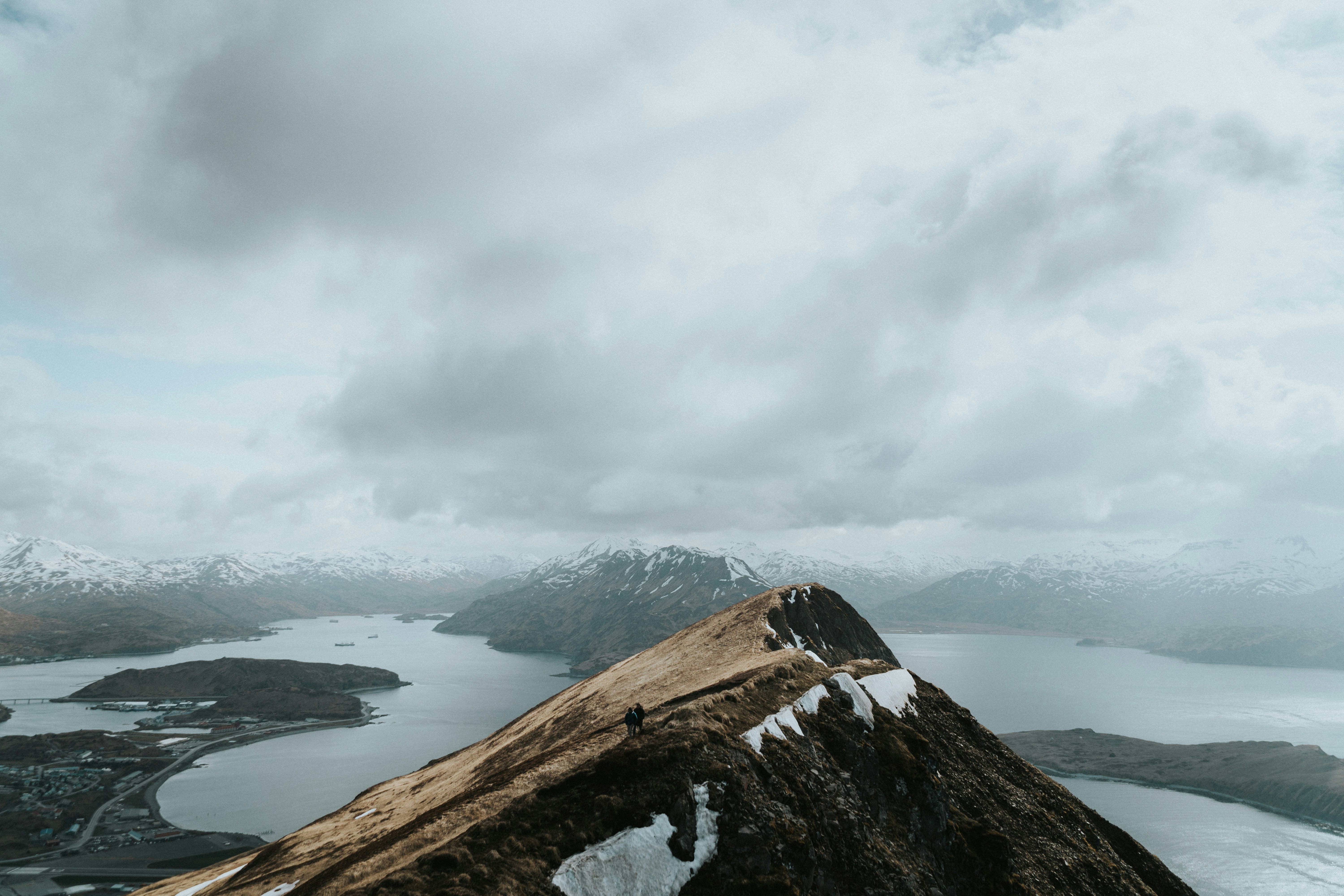 mountain under cloudy sky during daytime